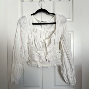 Free people beautiful white top.